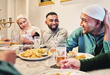 How do I invite Muslims  round for a meal?