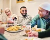 How do I invite Muslims  round for a meal?